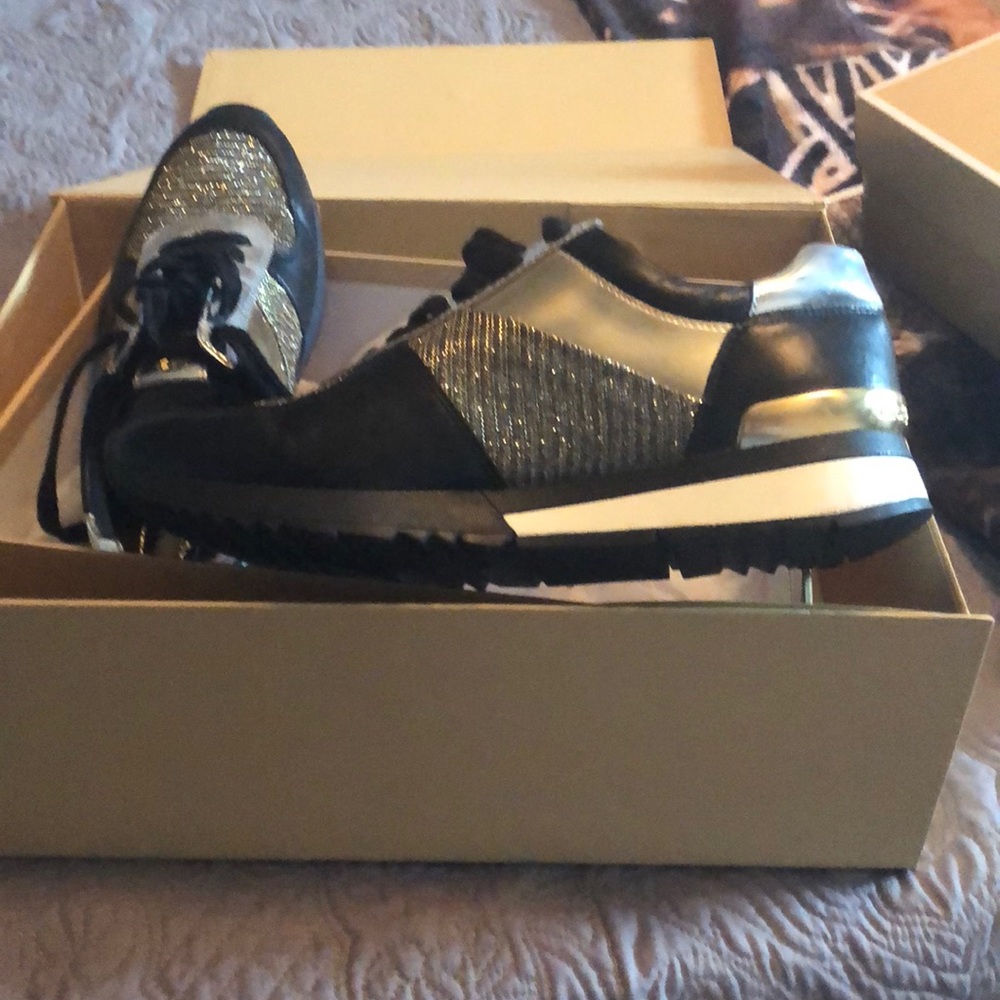 Michael Kors tennis shoes. Almost new. Worn once.